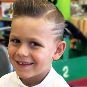 Boys haircut with a fade detail