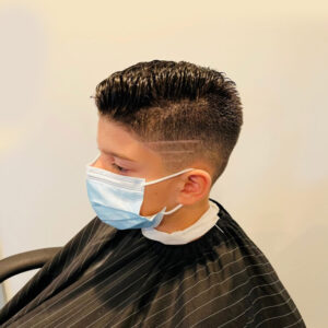 Boys haircut with a fade detail