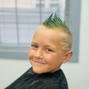 Boys haircut with complimentary hair color and style