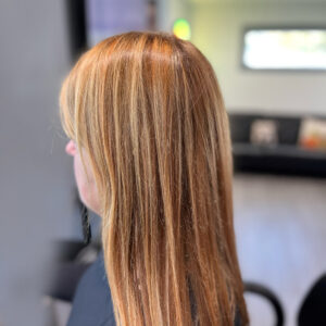 Auburn hair with peekaboo honey highlights