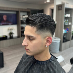 Men's Faded Sides Haircut with Added Texture