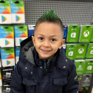 Boy's haircut and style with temporary hair spray