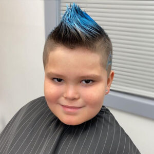 Boy's haircut and style with temporary hair spray